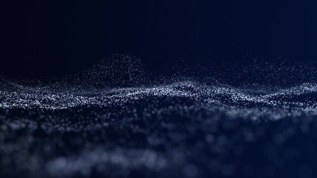 Blue abstract background with a flowing fractal wave of swirling light particles. Looping HD animation.