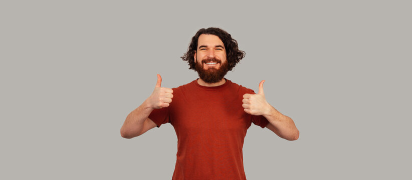 Bearded White Man Giving Double Thumbs Up, Enthusiastic Approval, Confident Smile, Casual Red Shirt, Upbeat