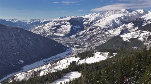 Slow pull in shot of Tarentaise valley with Bourg Saint Maurice in background