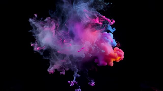 Vibrant clouds of colorful ink swirling and diffusing in dark water, creating an abstract explosion of color.