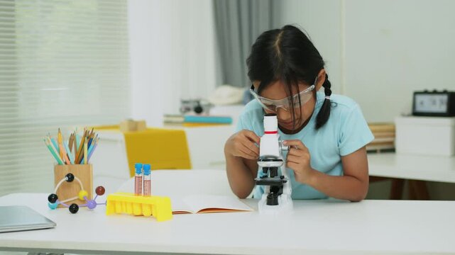 STEM Education Concept with Student Scientist and Laboratory Analysis Equipment