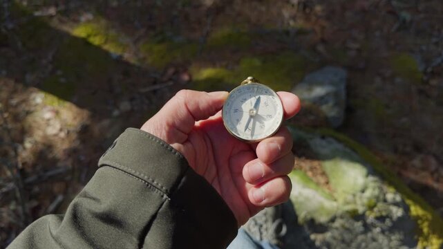 Solo Hiker With Compass In Forest Sunlight Concept Of Freedom Exploration Travel Navigation Direction Active Lifestyle Wilderness Nature Scene 4K