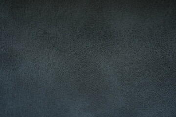 Fototapeta premium Blue leatherette texture close-up, synthetic leather background Pale blue artificial leather texture macro background