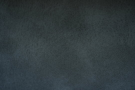 Blue leatherette texture close-up, synthetic leather background
Pale blue artificial leather texture macro background