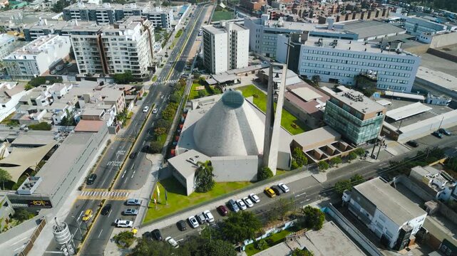 Aerial view of the Santuario Arquidiocesano del Sagrado Coraz&oacute;n de Jes&uacute;s in Surco, 4K drone shot during a sunny afternoon in Lima.