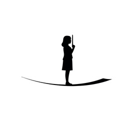 Fototapeta premium Silhouette of young girl holding wand.