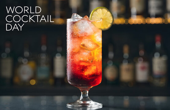 World Cocktail Day celebration poster, refreshing iced long drink with lime garnish, vibrant red and orange layered cocktail in bar setting