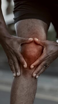 Sports, hands and man outdoor with knee pain, injury or accident for running challenge. Fitness, red glow and male runner in nature for exercise with muscle sprain, tendinitis or torn ligament.