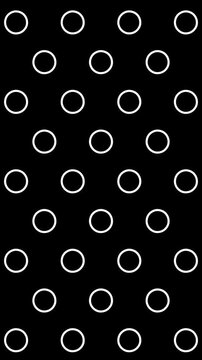 Animated Seamless Pattern Of Outlined Rings Scrolling Up With Glitch Effect On A Black Background, Seamless Loop, 9:16 Vertical Video