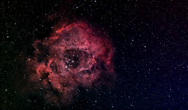 Sternenhimmel mit dem Rosettennebel und vielen Sternen in der Nacht
