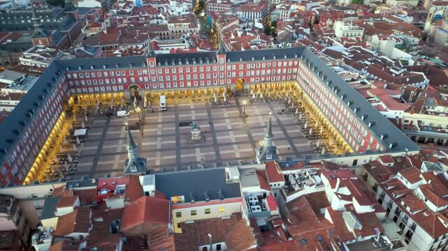 Aerial view of Plaza Mayor At Madrid. Spain. Medieval Buildings Landscape. Downtown District. Madrid At Community Of Madrid Spain. 