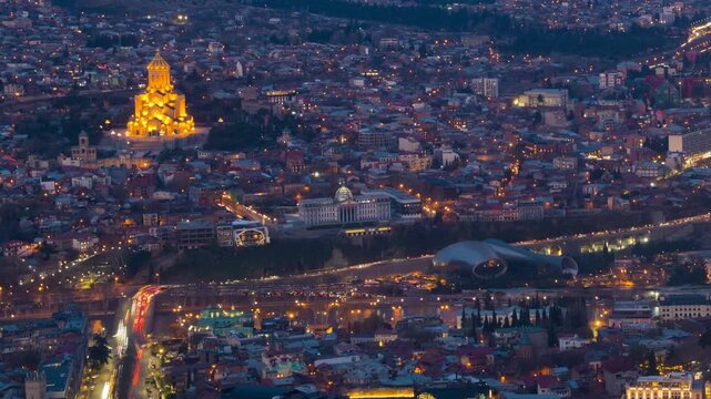 Tbilisi, Georgia. Aerial view of the city center of Tbilisi, Georgia. Time-lapse with car traffic from evening to night
