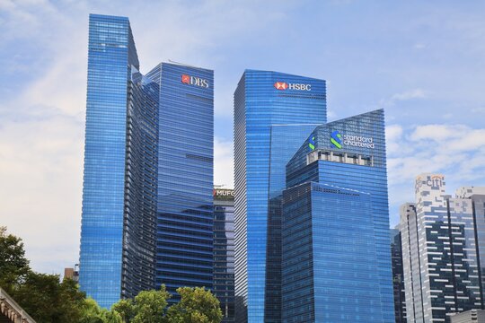 SINGAPORE CITY, SINGAPORE - MARCH 12, 2024: Bank office buildings in Singapore, with DBS Bank, HSBC, Standard Chartered and Citi.