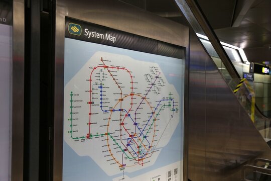SINGAPORE CITY, SINGAPORE - MARCH 12, 2024: System map of public transport Singapore MRT train lines at a station.
