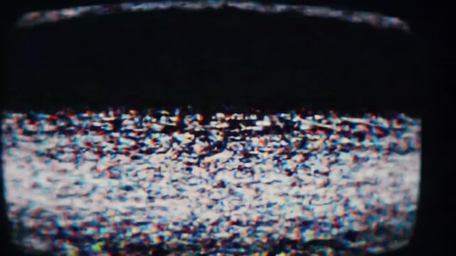A dynamic, abstract digital glitch video resembling a distressed retro CRT screen with shifting interference, pixelation, and chromatic aberration. Concept of data breakdown and visual overload