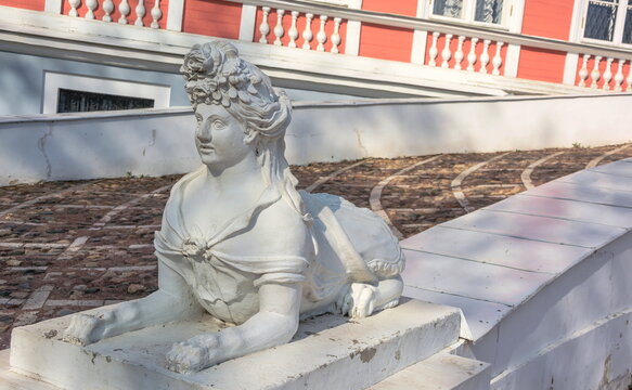 An ancient sculpture of the Sphinx adorns the main staircase.