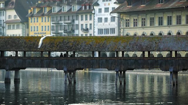 Historic Chapel Bridge and Water Tower on the Reuss River in Lucerne