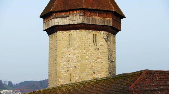Historic Chapel Bridge and Water Tower on the Reuss River in Lucerne