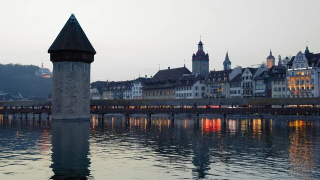 Shot of historic Chapel Bridge and Wasserturm tower in Lucerne, Switzerland
