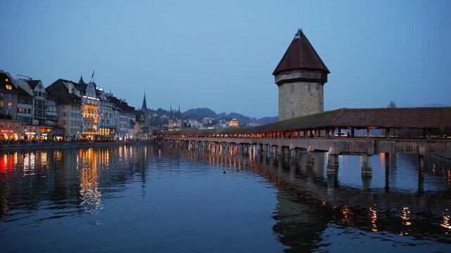 Shot of historic Chapel Bridge and Wasserturm tower in Lucerne, Switzerland
