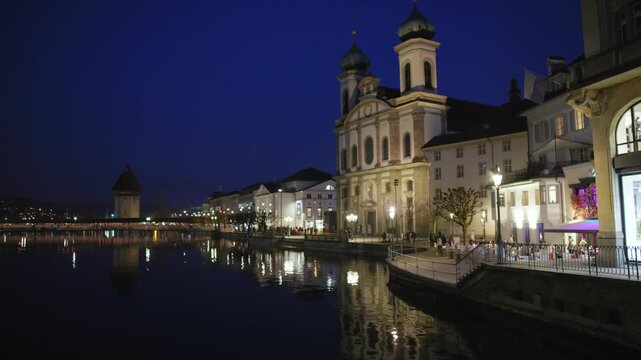 Shot of Lucerne illuminated old town and historic buildings at night