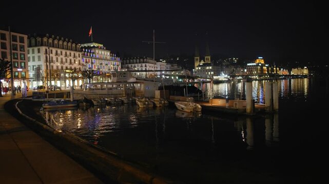 Shot of Lucerne illuminated old town and historic buildings at night