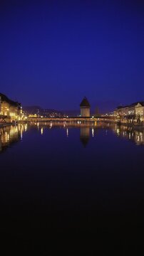 Shot of Lucerne illuminated old town and historic buildings at night