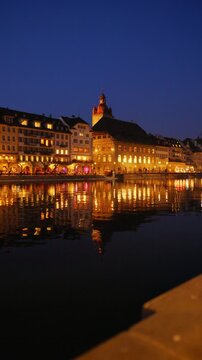 Shot of Lucerne illuminated old town and historic buildings at night