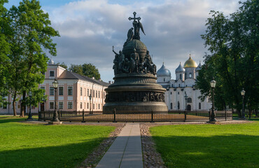 Obraz premium The Monument to the Millennium of Russia, erected in the Novgorod Kremlin in 1862, with the St. Sophia Cathedral in the background, Veliky Novgorod, Russia