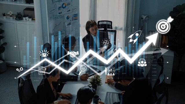 A dynamic business meeting in a modern office showcasing growth trends and digital graphics, symbolizing strategy, collaboration, and professional development among a team. Raster