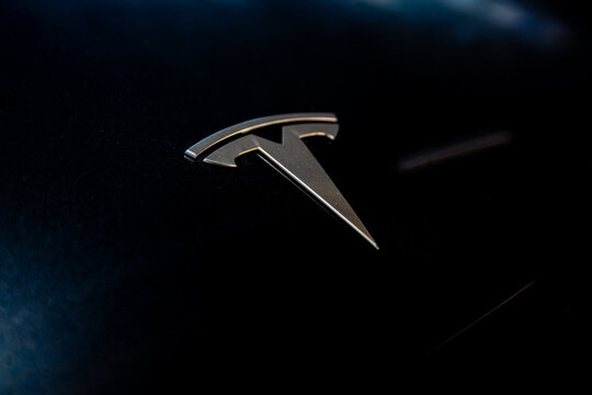 Tokyo, Japan - March 15, 2026: Tesla logo signage on a vehicle in Tokyo, Japan.
