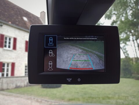 Rear View Camera Display in Utility Vehicle with Parking Assistance Guidelines
