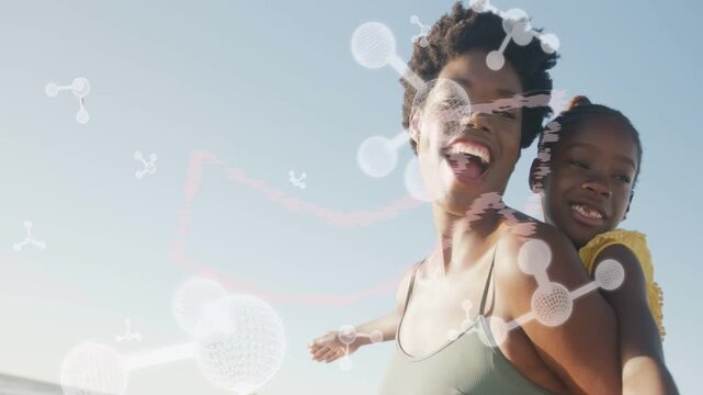 Woman carrying child at beach, camera zoom sparking molecules gliding over faces for health