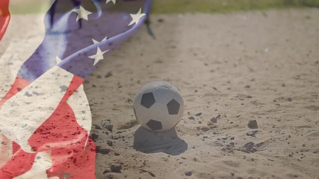 Barefoot child entering right nudging kicking soccer ball, drifting American flag overlay, playing