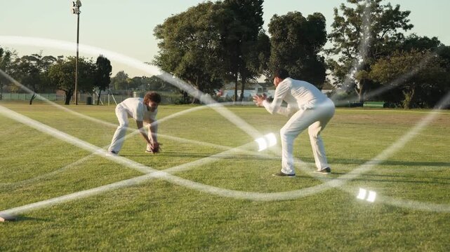 Left player starting cricket drill reaching bat to ball while mate reacting, overlay lighting grass