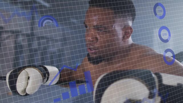 Male athlete starting boxing, focus pad appearing, punching while analytics overlaying grid, gauges