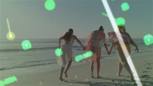 3 women linking hands, starting run, leaping to sea, green overlay drifting over them for marketing