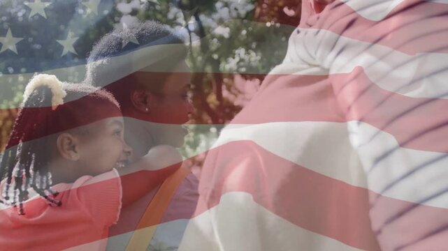 Mother carrying daughter on back, camera panning to father leaning, flag overlay for marketing