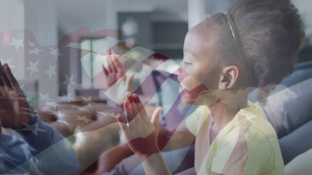 Dad and daughter clapping child initiating rhythm for education while thin flag overlay floating