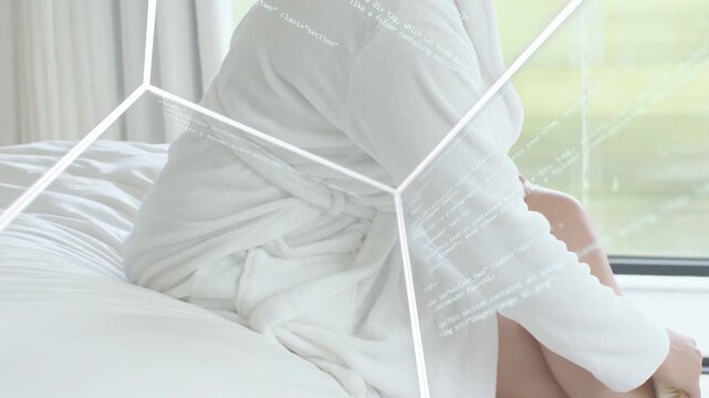 Woman holding cup shifting on bed, tech hex grid moving across frame obscuring parts, reflecting