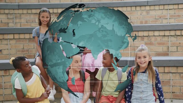 School girls on steps reacting to rotating globe, shifting then standing cheering for education