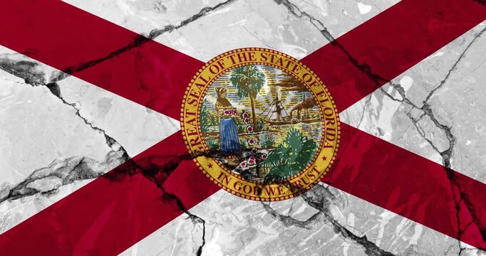 A panning video of a cracked wall with The florida state flag of the United States of America