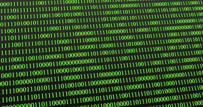 A panning video of a blinking green neon binary code technology concept