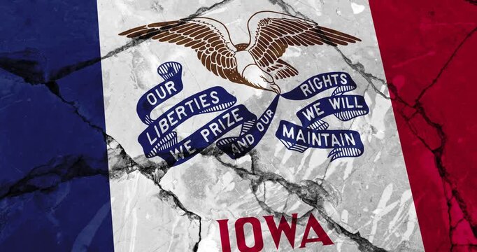 A panning video of a cracked wall with The iowa state flag of the United States of America