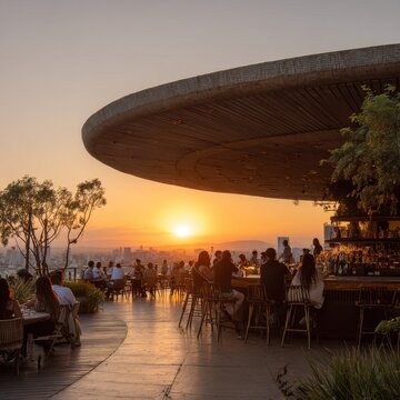 Patrons Enjoying Drinks on Giant Sombrero Rooftop Terrace at Sunset