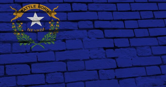 A panning video of a brick wall with the nevada state flag of the United States of America