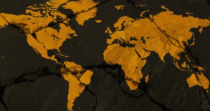 A panning video with an orange world political map over a brown cracked wall
