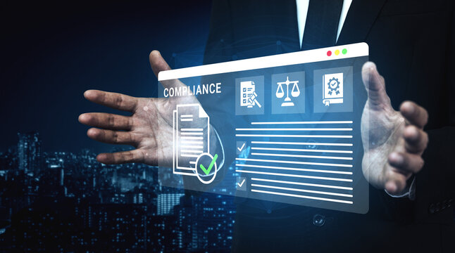 A businessman interacts with a digital compliance document displaying law icons, emphasizing urban innovation against a nighttime city skyline backdrop. Ledger