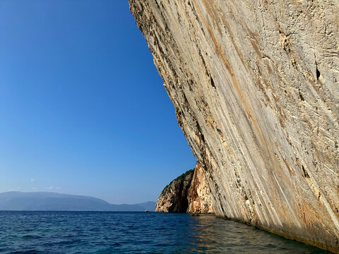 At the foot of the cliff