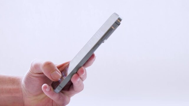 Close up of hand typing on smartphone touchscreen with sound
